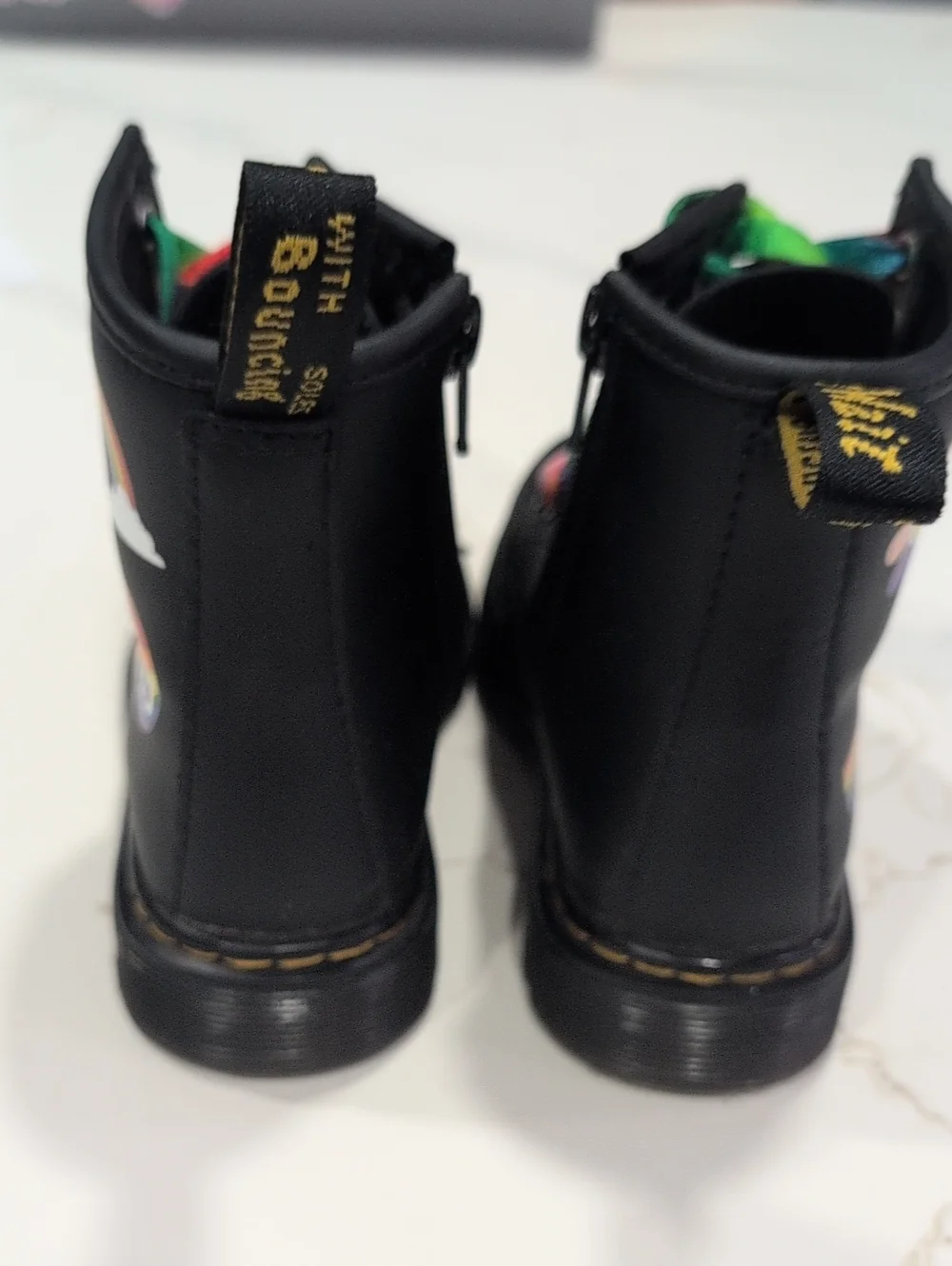 Dr. Martens Black Leather Boots with Multicolor Laces